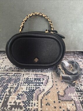 Call it Spring crossbody clutch bag